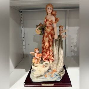 Elegant Figurine with Cherubs and Swan